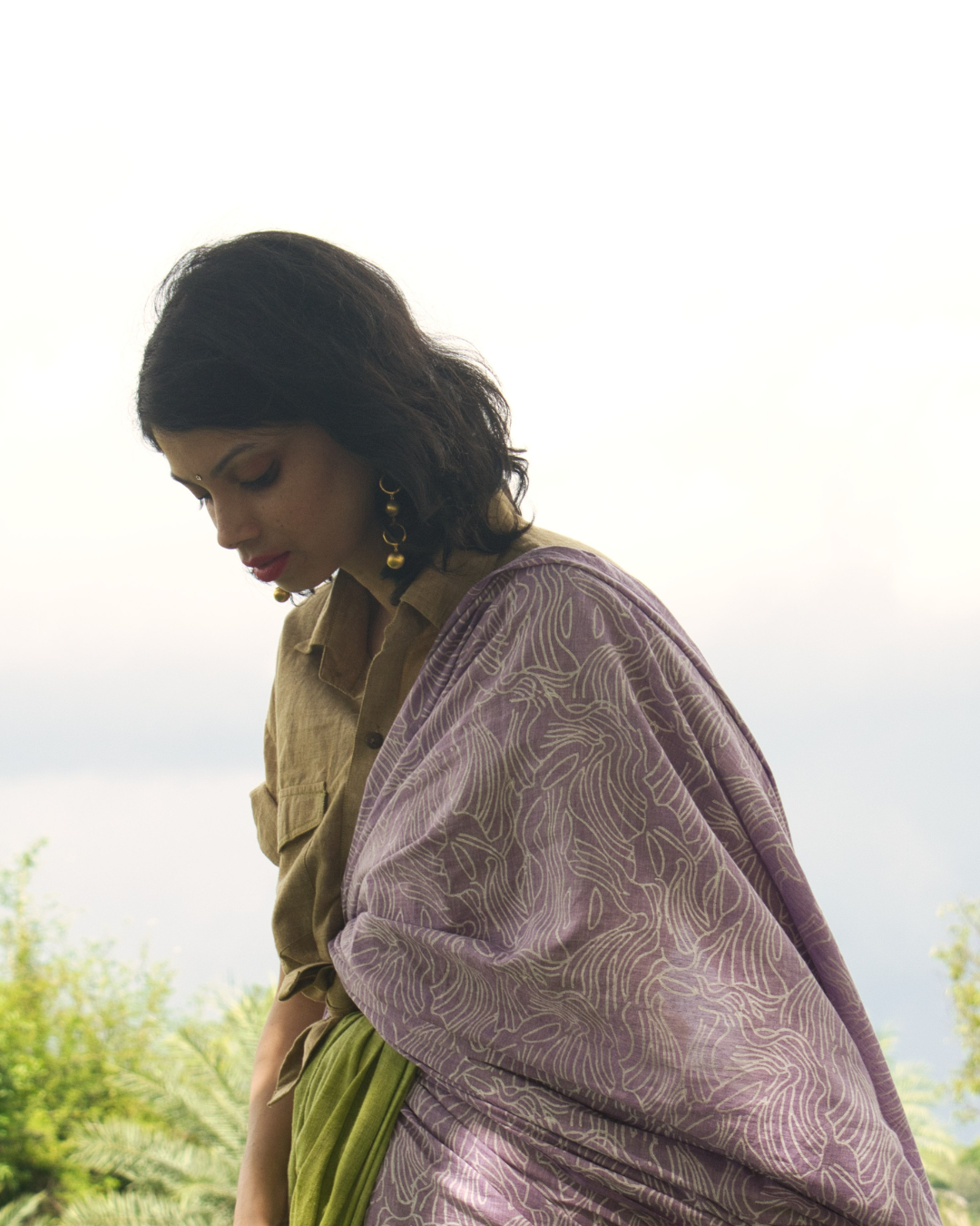 Green and purple half N half block printed sari