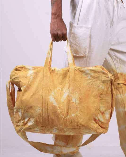 turmeric tie-dye duffel bag.