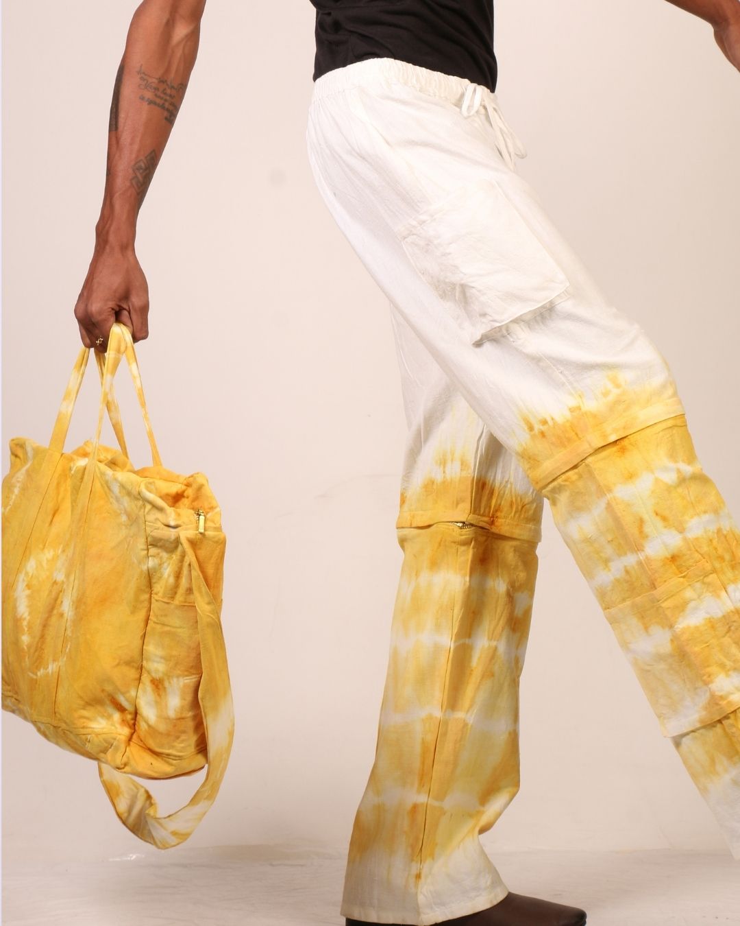 yellow tie-dye cotton canvas weekender bag